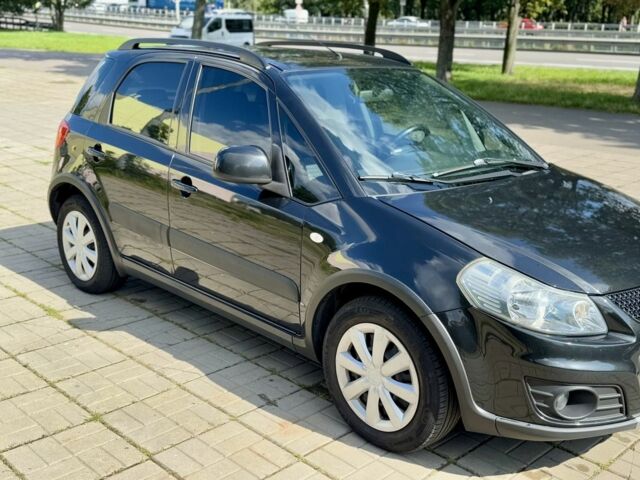 Черный Сузуки СХ4, объемом двигателя 1.6 л и пробегом 140 тыс. км за 9000 $, фото 6 на Automoto.ua