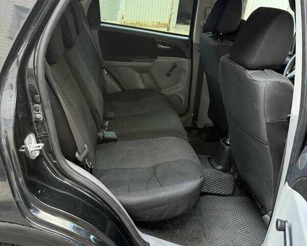 Черный Сузуки СХ4, объемом двигателя 1.6 л и пробегом 235 тыс. км за 9000 $, фото 9 на Automoto.ua