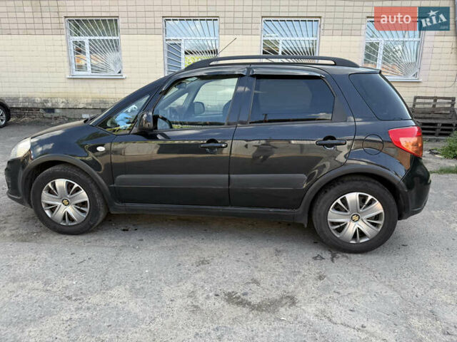 Черный Сузуки СХ4, объемом двигателя 1.6 л и пробегом 235 тыс. км за 9000 $, фото 4 на Automoto.ua
