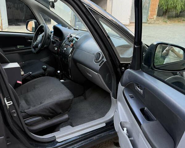 Черный Сузуки СХ4, объемом двигателя 1.6 л и пробегом 235 тыс. км за 9000 $, фото 10 на Automoto.ua