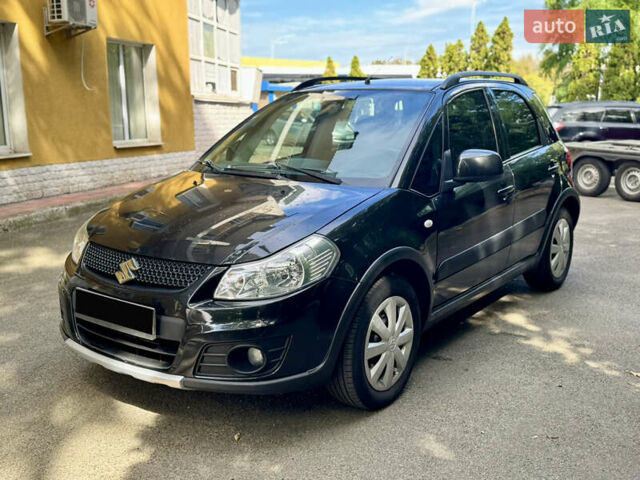 Черный Сузуки СХ4, объемом двигателя 1.6 л и пробегом 175 тыс. км за 8700 $, фото 7 на Automoto.ua