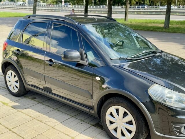 Черный Сузуки СХ4, объемом двигателя 1.6 л и пробегом 140 тыс. км за 9000 $, фото 2 на Automoto.ua