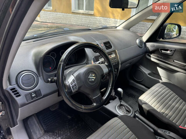 Черный Сузуки СХ4, объемом двигателя 1.6 л и пробегом 175 тыс. км за 8700 $, фото 14 на Automoto.ua