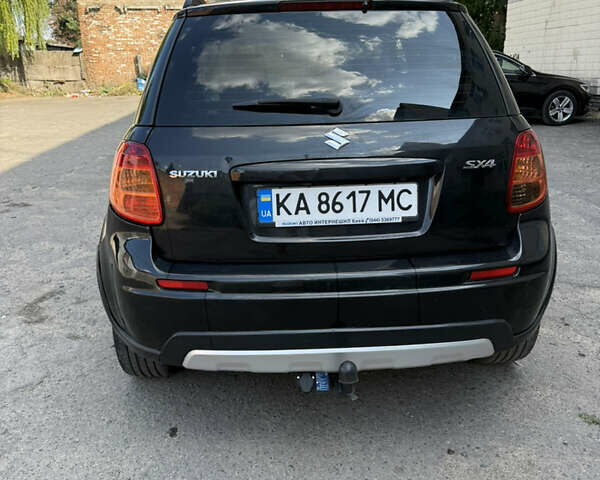 Черный Сузуки СХ4, объемом двигателя 1.6 л и пробегом 235 тыс. км за 9000 $, фото 3 на Automoto.ua