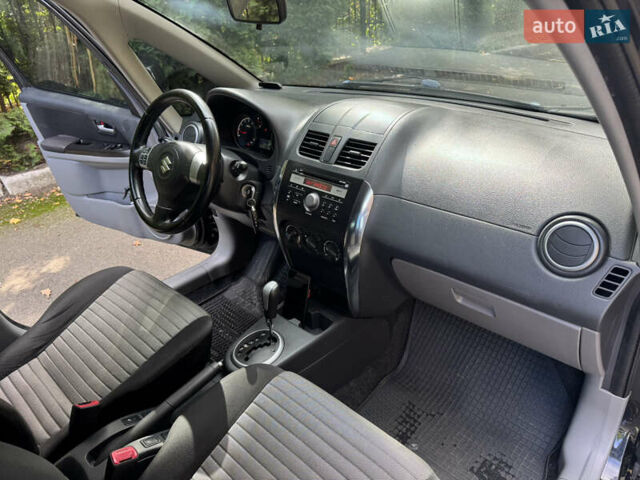 Черный Сузуки СХ4, объемом двигателя 1.6 л и пробегом 175 тыс. км за 8700 $, фото 24 на Automoto.ua