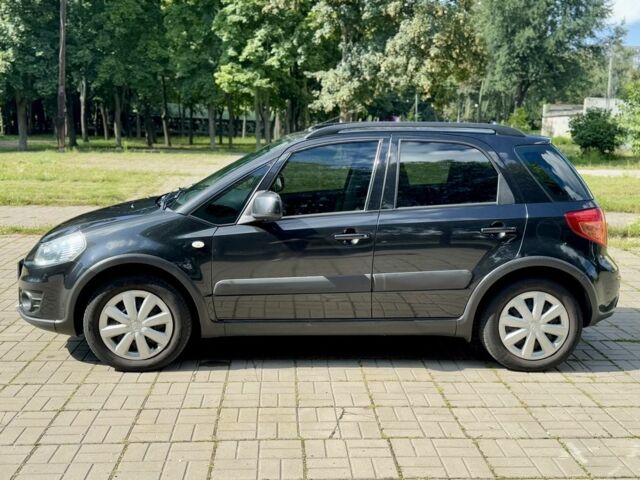Черный Сузуки СХ4, объемом двигателя 1.6 л и пробегом 140 тыс. км за 9000 $, фото 3 на Automoto.ua