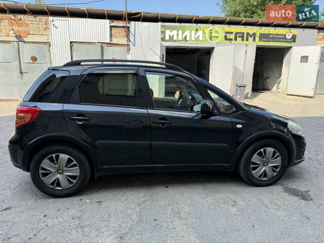 Черный Сузуки СХ4, объемом двигателя 1.6 л и пробегом 235 тыс. км за 9000 $, фото 2 на Automoto.ua