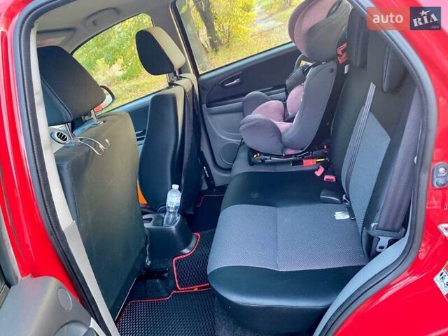 Красный Сузуки СХ4, объемом двигателя 1.6 л и пробегом 56 тыс. км за 8200 $, фото 17 на Automoto.ua