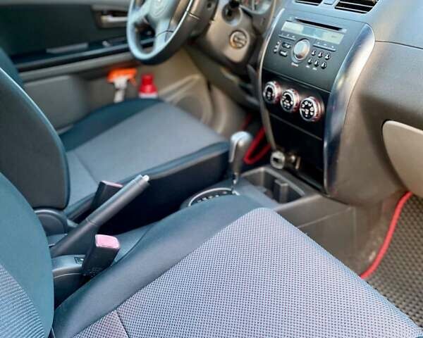 Красный Сузуки СХ4, объемом двигателя 1.6 л и пробегом 56 тыс. км за 8200 $, фото 6 на Automoto.ua