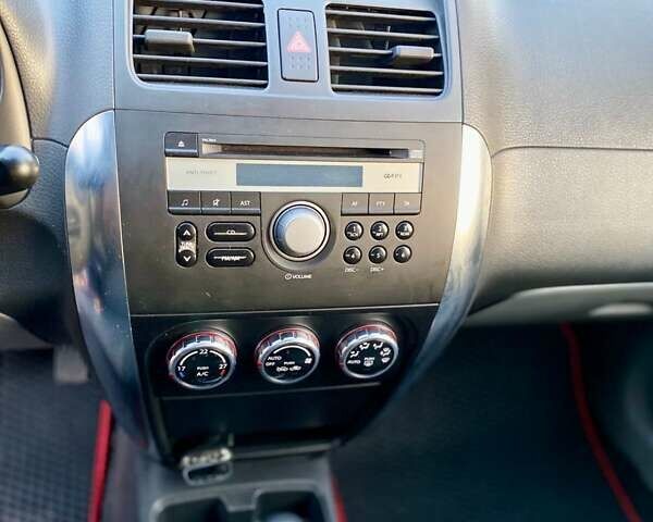 Красный Сузуки СХ4, объемом двигателя 1.6 л и пробегом 56 тыс. км за 8200 $, фото 15 на Automoto.ua