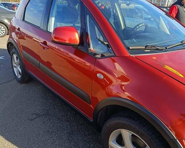 Красный Сузуки СХ4, объемом двигателя 0 л и пробегом 184 тыс. км за 6200 $, фото 2 на Automoto.ua