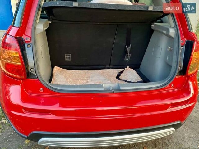 Красный Сузуки СХ4, объемом двигателя 1.6 л и пробегом 56 тыс. км за 8200 $, фото 2 на Automoto.ua