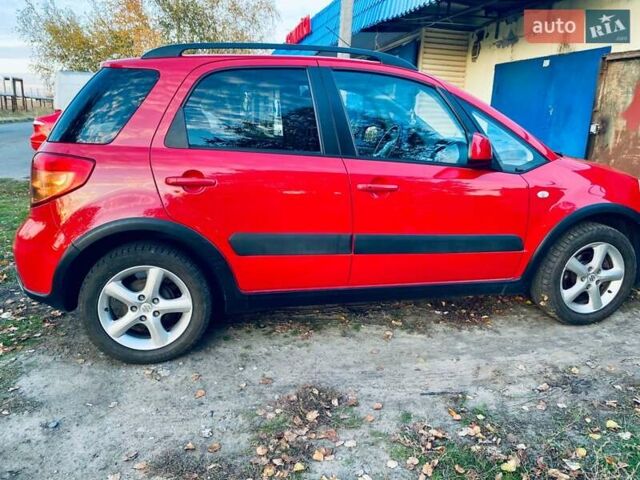 Красный Сузуки СХ4, объемом двигателя 1.6 л и пробегом 56 тыс. км за 8200 $, фото 8 на Automoto.ua