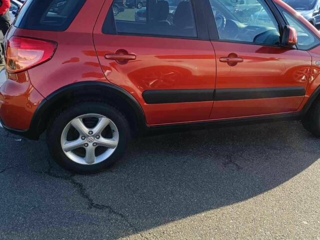 Красный Сузуки СХ4, объемом двигателя 0 л и пробегом 184 тыс. км за 6200 $, фото 1 на Automoto.ua