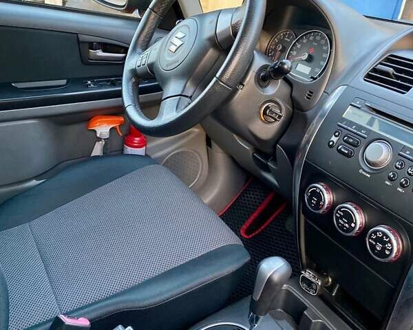 Красный Сузуки СХ4, объемом двигателя 1.6 л и пробегом 56 тыс. км за 8200 $, фото 12 на Automoto.ua