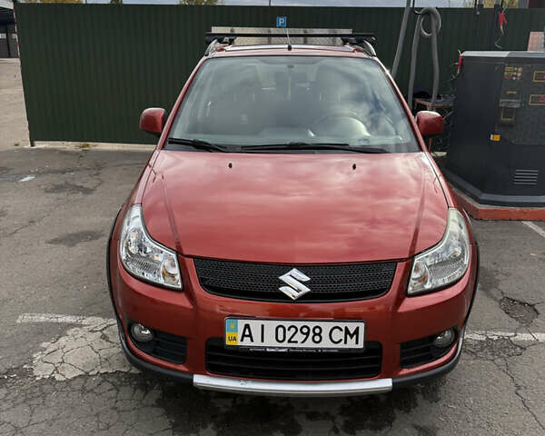 Сузуки СХ4 2007 в Борисполе на Automoto.ua Красный Сузуки СХ4, объемом двигателя 1.6 л и пробегом 141 тыс. км за 7000 $, фото 7 на Automoto.ua