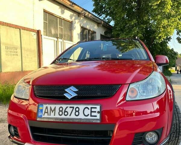Красный Сузуки СХ4, объемом двигателя 1.6 л и пробегом 233 тыс. км за 5300 $, фото 6 на Automoto.ua