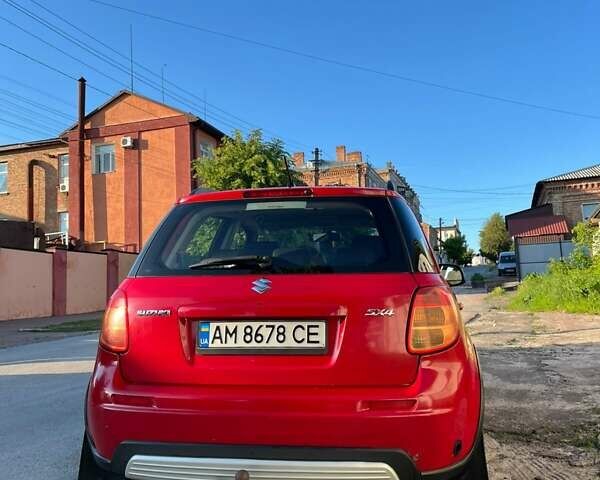 Красный Сузуки СХ4, объемом двигателя 1.6 л и пробегом 233 тыс. км за 5300 $, фото 5 на Automoto.ua
