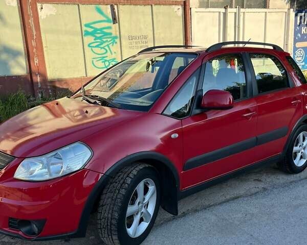 Красный Сузуки СХ4, объемом двигателя 1.6 л и пробегом 233 тыс. км за 5300 $, фото 4 на Automoto.ua
