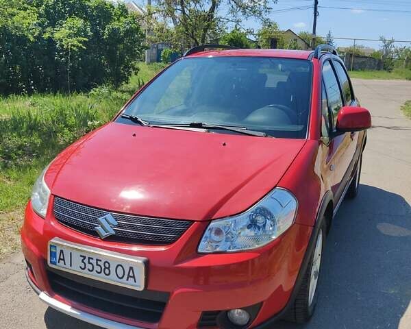Червоний Сузукі СХ4, об'ємом двигуна 1.59 л та пробігом 211 тис. км за 5200 $, фото 1 на Automoto.ua