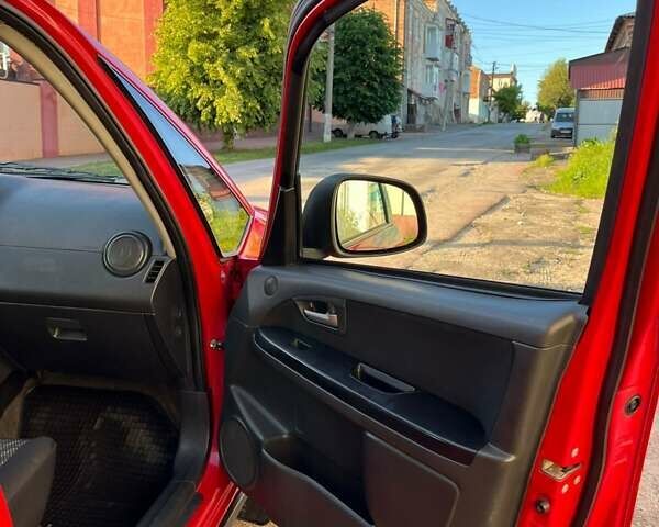 Красный Сузуки СХ4, объемом двигателя 1.6 л и пробегом 233 тыс. км за 5300 $, фото 12 на Automoto.ua