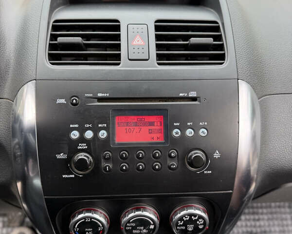 Сузуки СХ4 2007 в Борисполе на Automoto.ua Красный Сузуки СХ4, объемом двигателя 1.6 л и пробегом 141 тыс. км за 7000 $, фото 16 на Automoto.ua