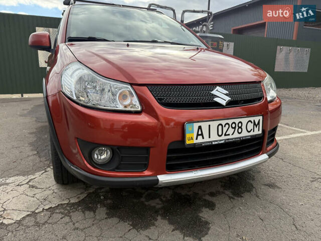Сузуки СХ4 2007 в Борисполе на Automoto.ua Красный Сузуки СХ4, объемом двигателя 1.6 л и пробегом 141 тыс. км за 7000 $, фото 4 на Automoto.ua