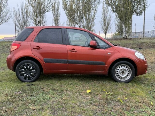Красный Сузуки СХ4, объемом двигателя 1.6 л и пробегом 235 тыс. км за 3200 $, фото 5 на Automoto.ua