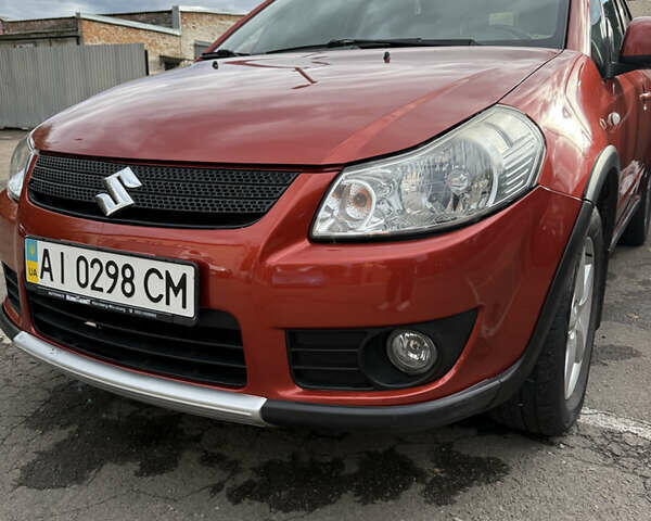 Сузуки СХ4 2007 в Борисполе на Automoto.ua Красный Сузуки СХ4, объемом двигателя 1.6 л и пробегом 141 тыс. км за 7000 $, фото 6 на Automoto.ua