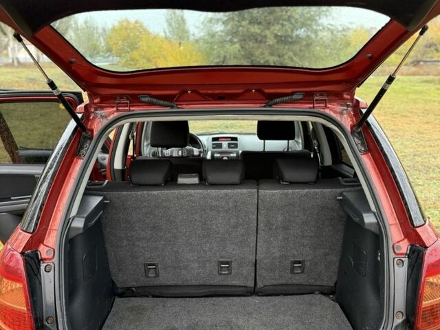 Красный Сузуки СХ4, объемом двигателя 1.6 л и пробегом 235 тыс. км за 3200 $, фото 10 на Automoto.ua