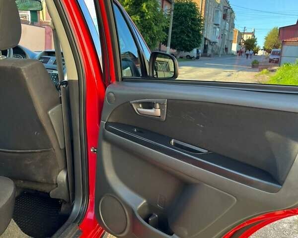 Красный Сузуки СХ4, объемом двигателя 1.6 л и пробегом 233 тыс. км за 5300 $, фото 11 на Automoto.ua