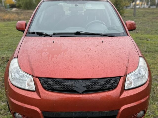 Красный Сузуки СХ4, объемом двигателя 1.6 л и пробегом 235 тыс. км за 3200 $, фото 7 на Automoto.ua
