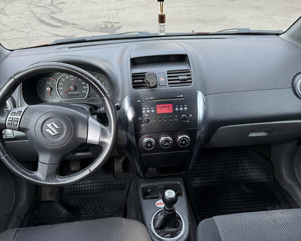 Сузуки СХ4 2007 в Борисполе на Automoto.ua Красный Сузуки СХ4, объемом двигателя 1.6 л и пробегом 141 тыс. км за 7000 $, фото 14 на Automoto.ua