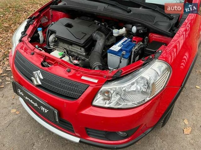 Красный Сузуки СХ4, объемом двигателя 1.6 л и пробегом 101 тыс. км за 7700 $, фото 17 на Automoto.ua