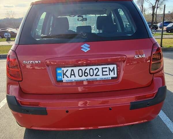 Красный Сузуки СХ4, объемом двигателя 1.59 л и пробегом 228 тыс. км за 5999 $, фото 2 на Automoto.ua