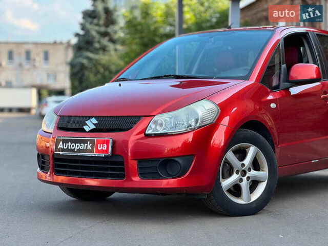 Красный Сузуки СХ4, объемом двигателя 1.6 л и пробегом 281 тыс. км за 5790 $, фото 1 на Automoto.ua