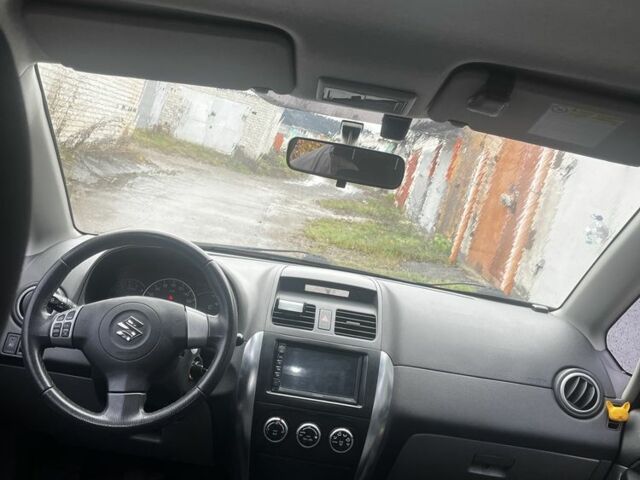 Красный Сузуки СХ4, объемом двигателя 1.6 л и пробегом 183 тыс. км за 6800 $, фото 5 на Automoto.ua