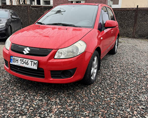 Красный Сузуки СХ4, объемом двигателя 1.59 л и пробегом 183 тыс. км за 6700 $, фото 1 на Automoto.ua