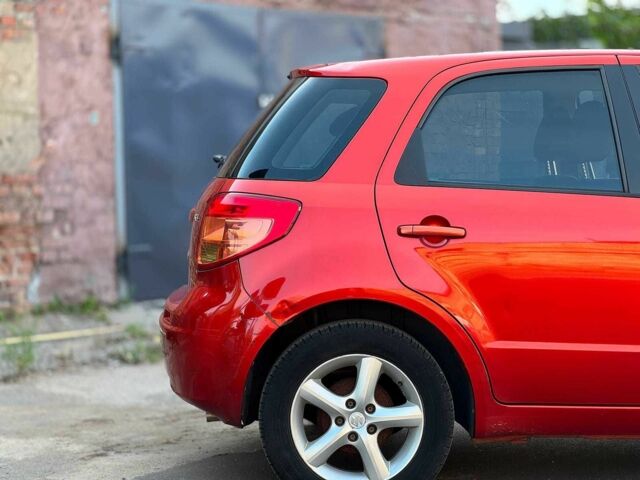 Красный Сузуки СХ4, объемом двигателя 1.6 л и пробегом 281 тыс. км за 5190 $, фото 10 на Automoto.ua