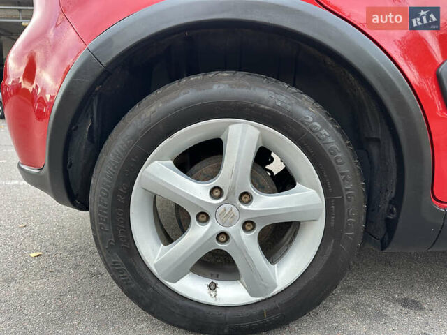 Сузуки СХ4 2008 в Киеве на Automoto.ua Красный Сузуки СХ4, объемом двигателя 1.6 л и пробегом 170 тыс. км за 7550 $, фото 18 на Automoto.ua