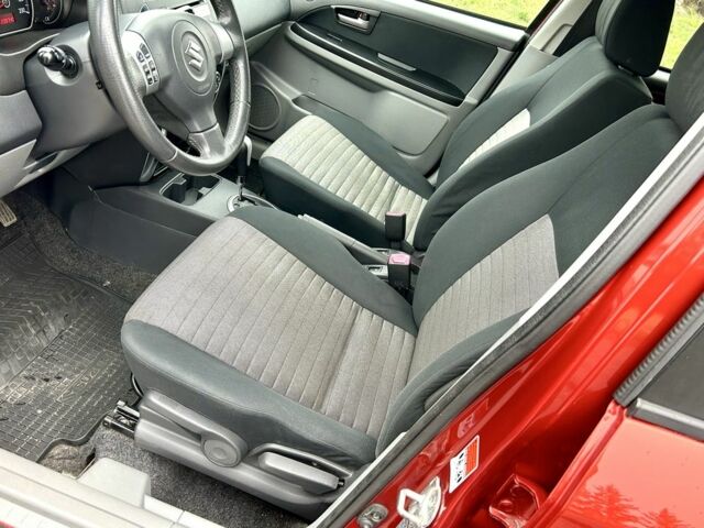 Красный Сузуки СХ4, объемом двигателя 1.6 л и пробегом 239 тыс. км за 7500 $, фото 13 на Automoto.ua