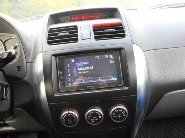 Червоний Сузукі СХ4, об'ємом двигуна 1.6 л та пробігом 200 тис. км за 7000 $, фото 6 на Automoto.ua