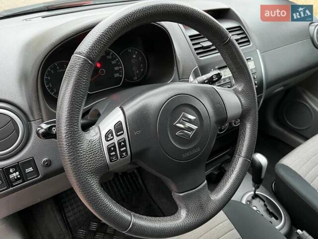 Красный Сузуки СХ4, объемом двигателя 1.6 л и пробегом 101 тыс. км за 7700 $, фото 9 на Automoto.ua