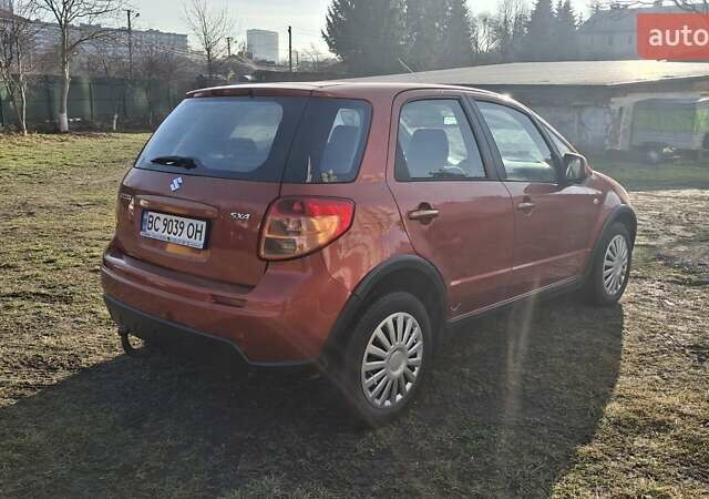 Красный Сузуки СХ4, объемом двигателя 1.5 л и пробегом 123 тыс. км за 4300 $, фото 2 на Automoto.ua