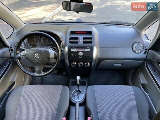 Червоний Сузукі СХ4, об'ємом двигуна 1.6 л та пробігом 145 тис. км за 7600 $, фото 17 на Automoto.ua