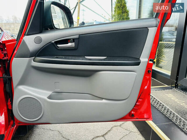 Красный Сузуки СХ4, объемом двигателя 1.6 л и пробегом 180 тыс. км за 7900 $, фото 23 на Automoto.ua