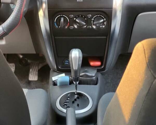 Красный Сузуки СХ4, объемом двигателя 1.59 л и пробегом 228 тыс. км за 5999 $, фото 11 на Automoto.ua