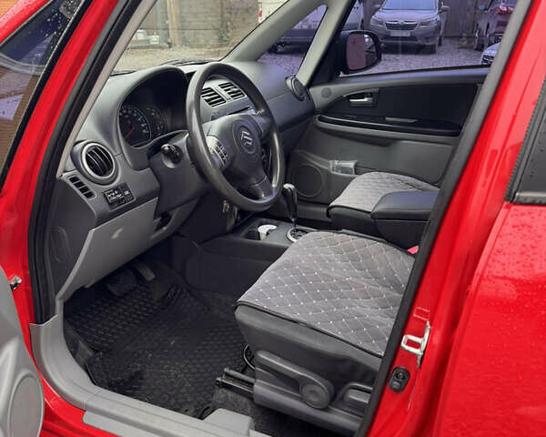 Красный Сузуки СХ4, объемом двигателя 1.59 л и пробегом 183 тыс. км за 6700 $, фото 4 на Automoto.ua