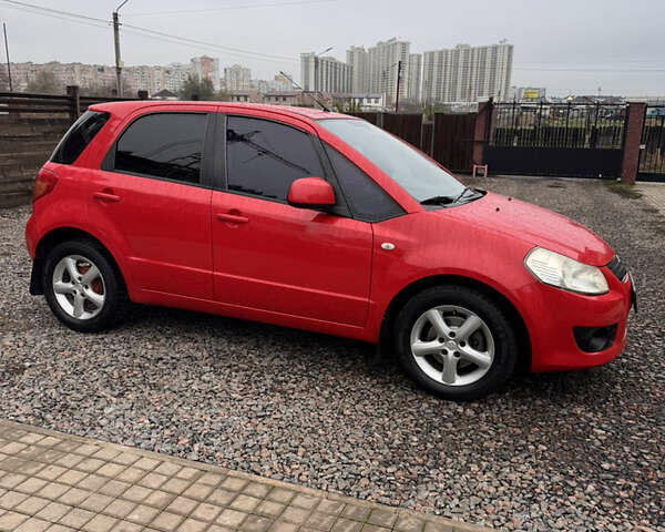 Красный Сузуки СХ4, объемом двигателя 1.59 л и пробегом 183 тыс. км за 6700 $, фото 9 на Automoto.ua
