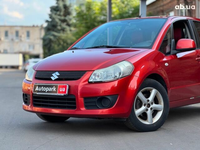 Красный Сузуки СХ4, объемом двигателя 1.6 л и пробегом 281 тыс. км за 5790 $, фото 1 на Automoto.ua